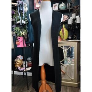 Long black sleeveless cardigan